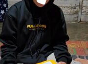 Tangkapan layar video terduga korban berinisial S membacakan klarifikasi yang sudah tertulis di sebuah kertas.